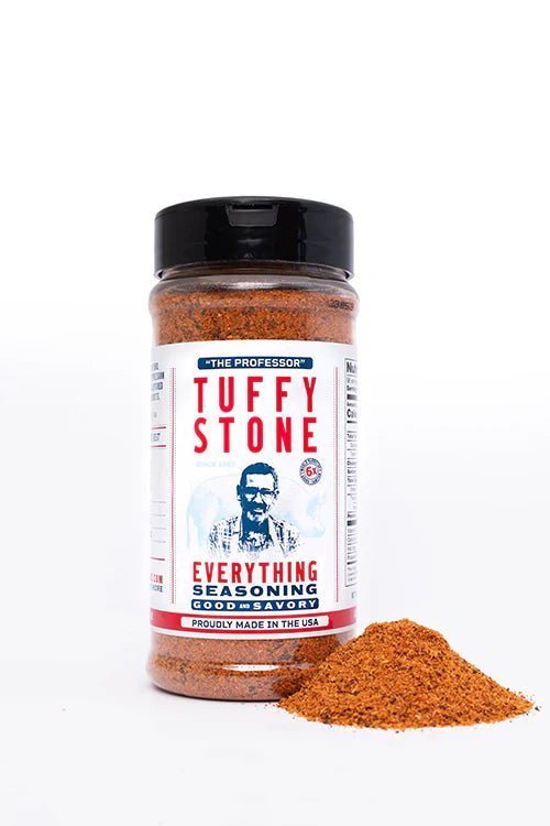Close-up of Tuffy Stone Everything Seasoning label highlighting hand-crafted ingredients and vibrant orange and black design