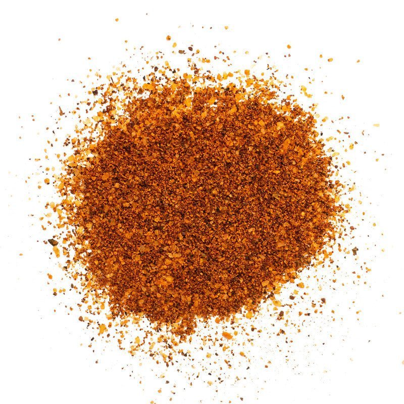 Close-up of Tuffy Stone Everything Seasoning label highlighting natural ingredients and hand-crafted details on 12.1oz jar
