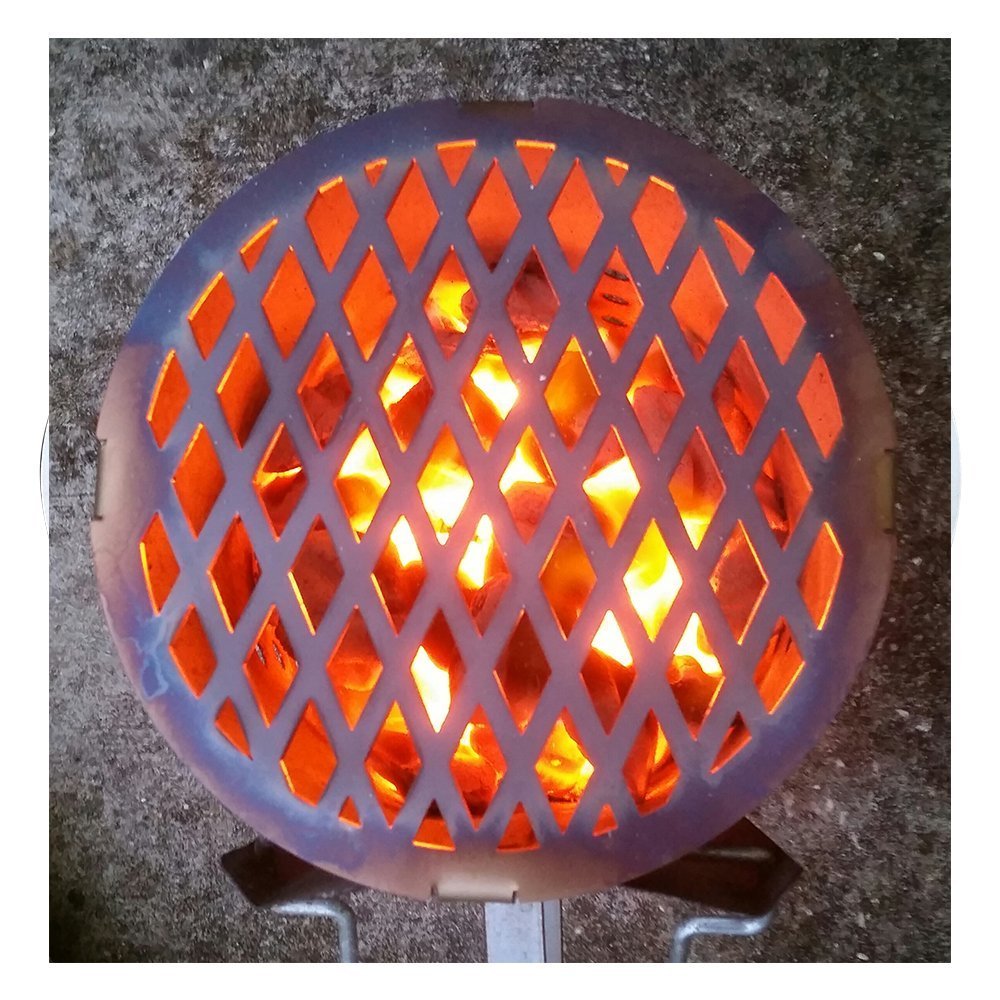Close-up of the cylindrical charcoal chimney with perforated metal surface and rust-resistant steel handle, showing textured
