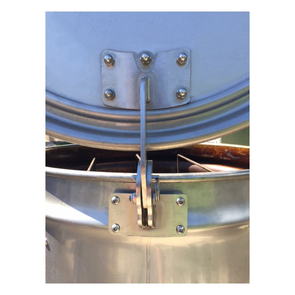 Close-up of the black cast iron hinge with textured surface and precise machining details on the drum smoker lid edge